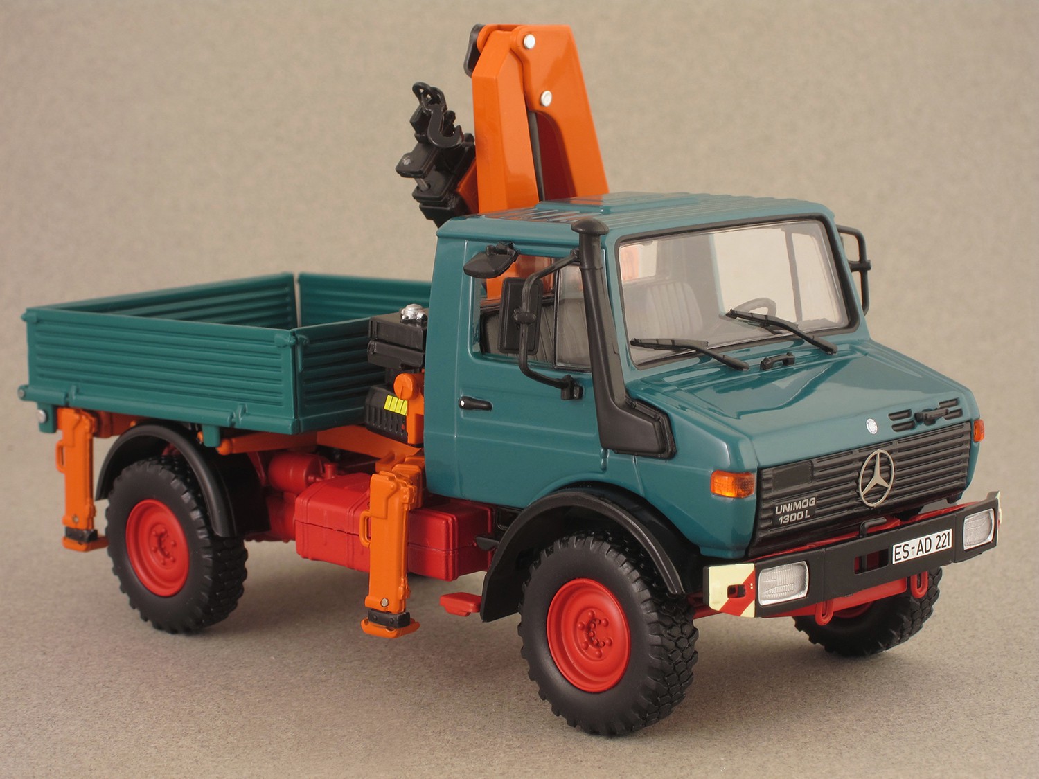 Unimog 1300L benne + grue (Minichamps) 1/43e