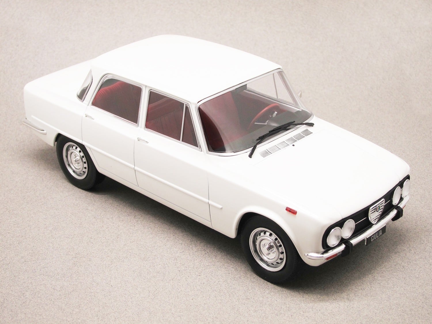 Alfa Romeo Nuova Giulia 1300 Super 1974 (MCG) 1/18e
