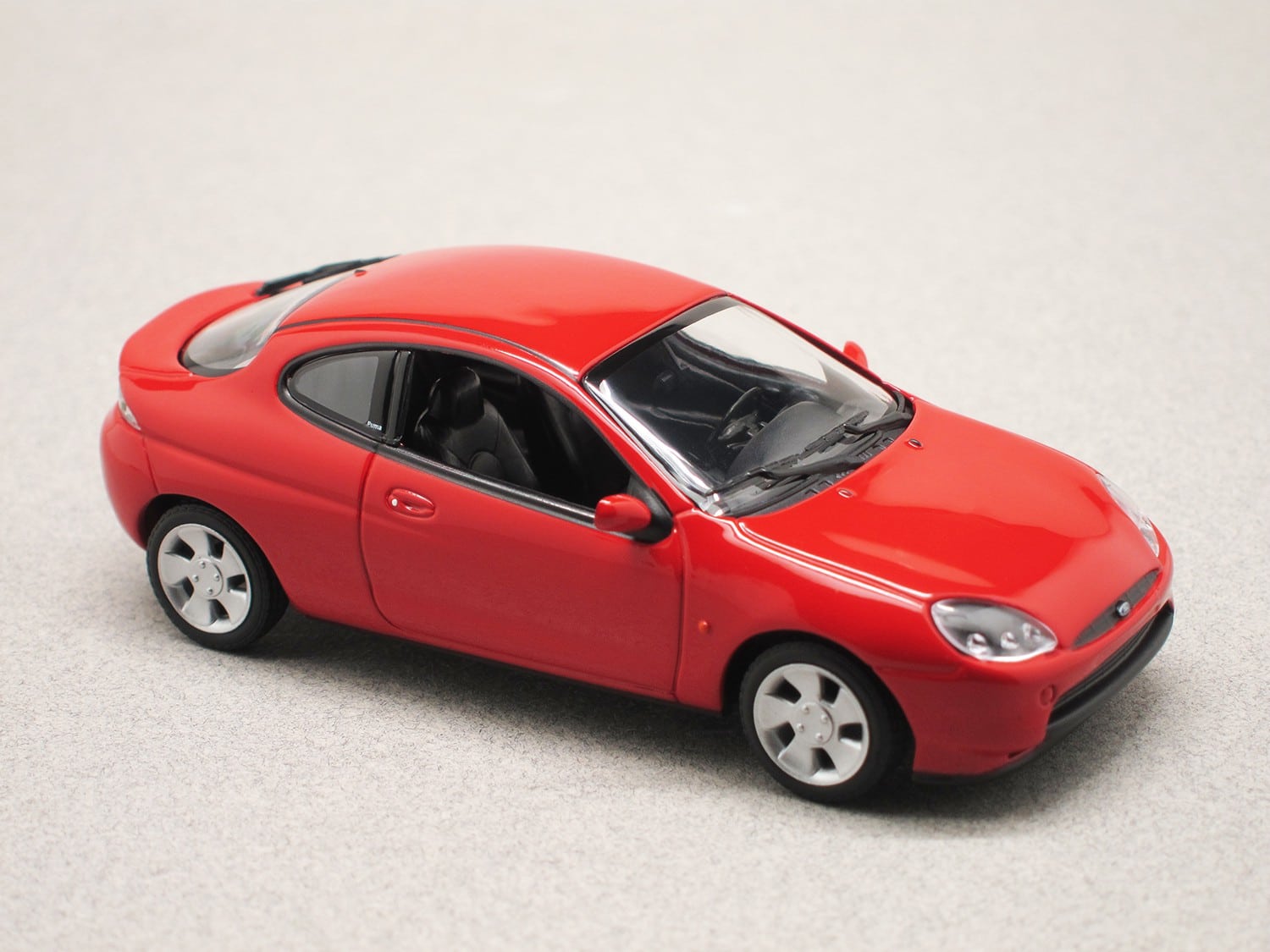 Ford Puma 1997 red Maxichamps 1 43 Minicarweb