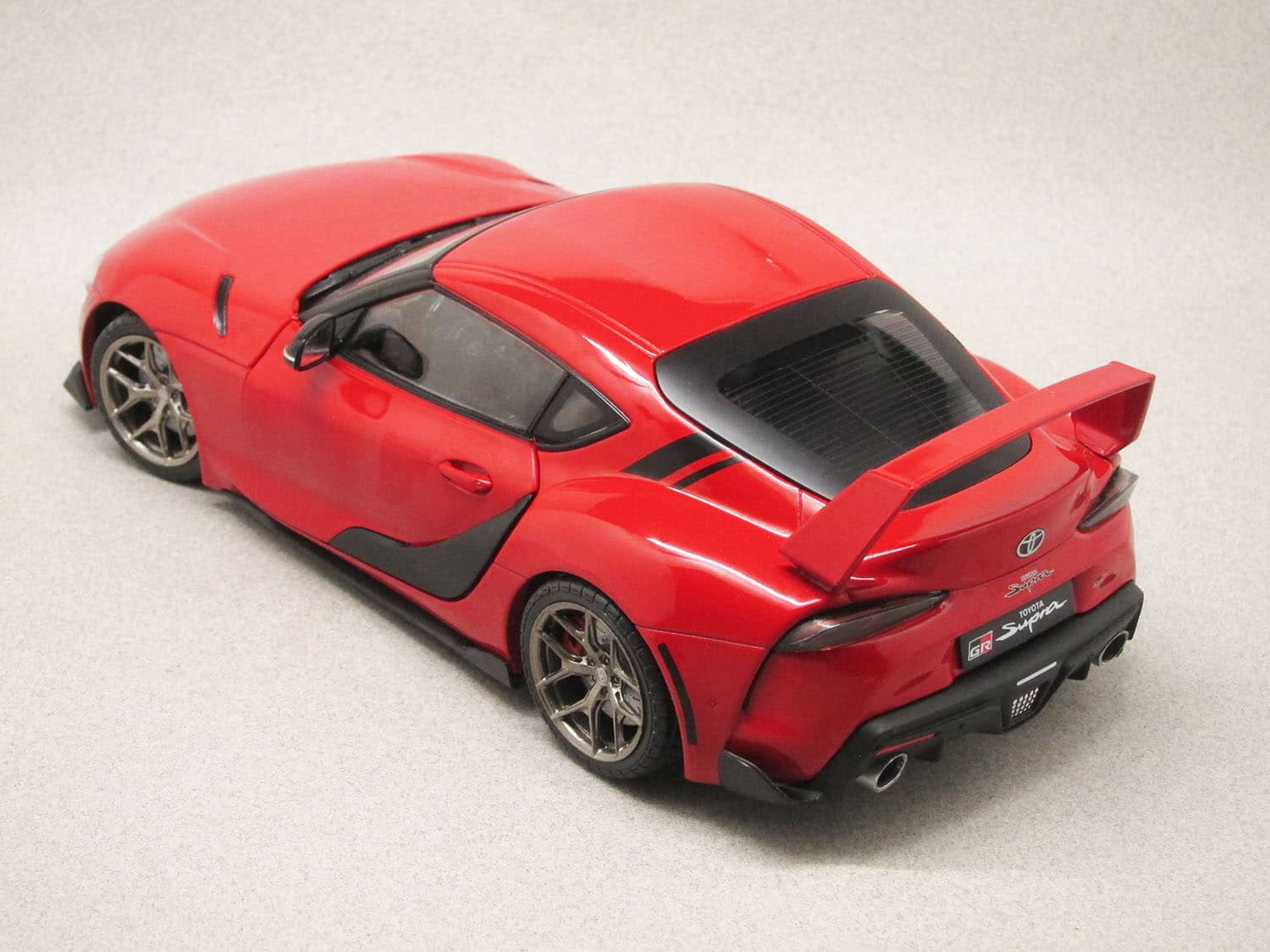 Model car Toyota Supra GR red, 1:18 Solido