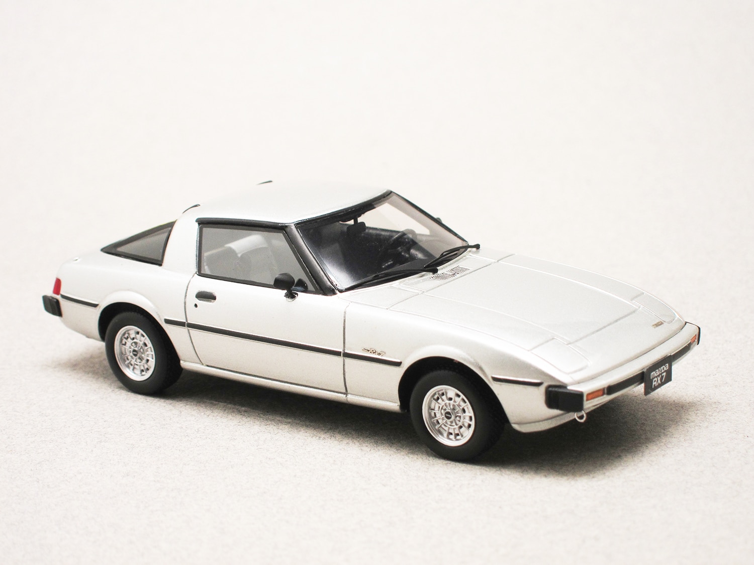 Mazda RX-7 1978 grise (Schuco) 1/43e