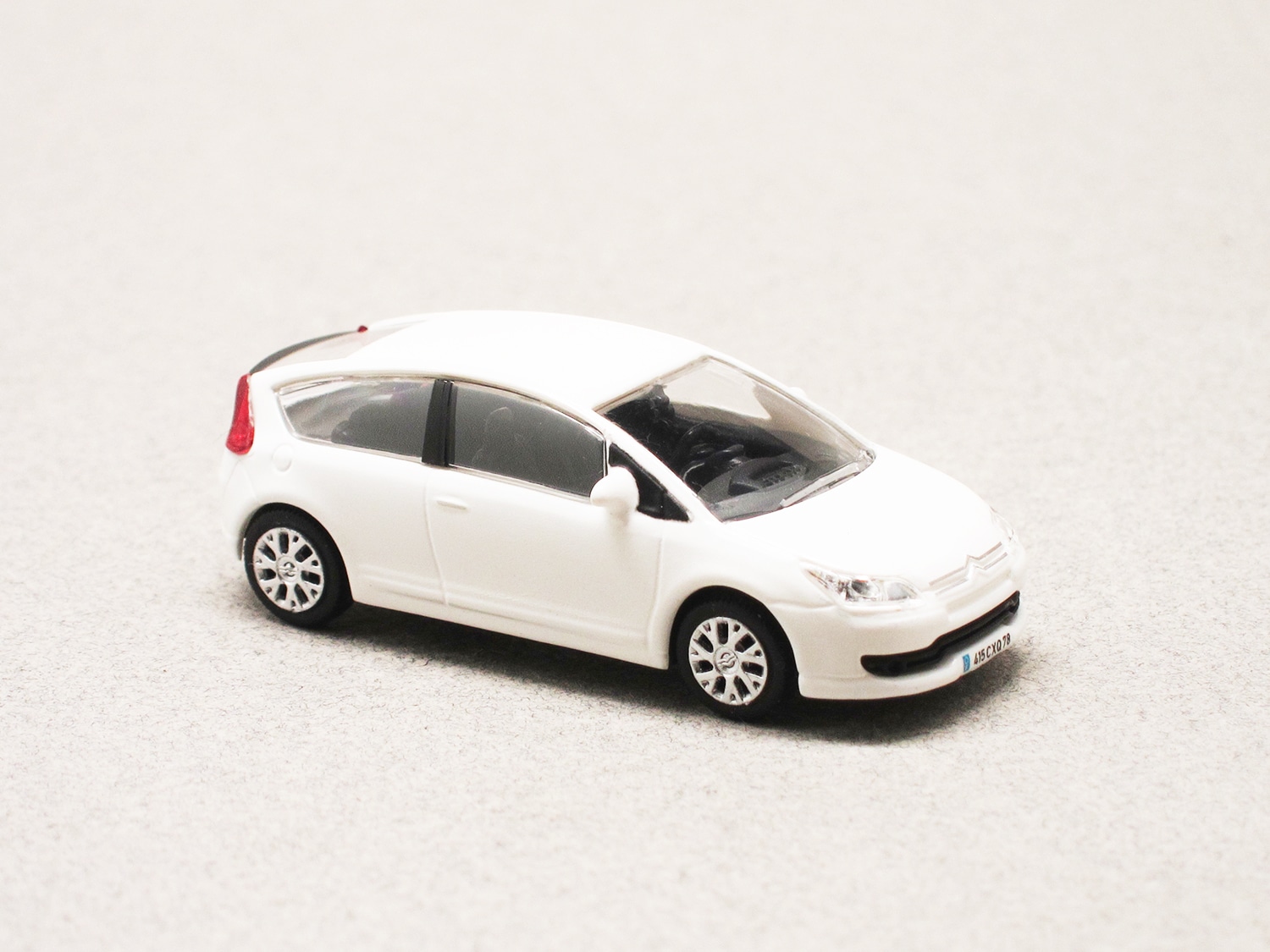 Citroën C4 Coupé 2004 blanche (Norev) 1/87e